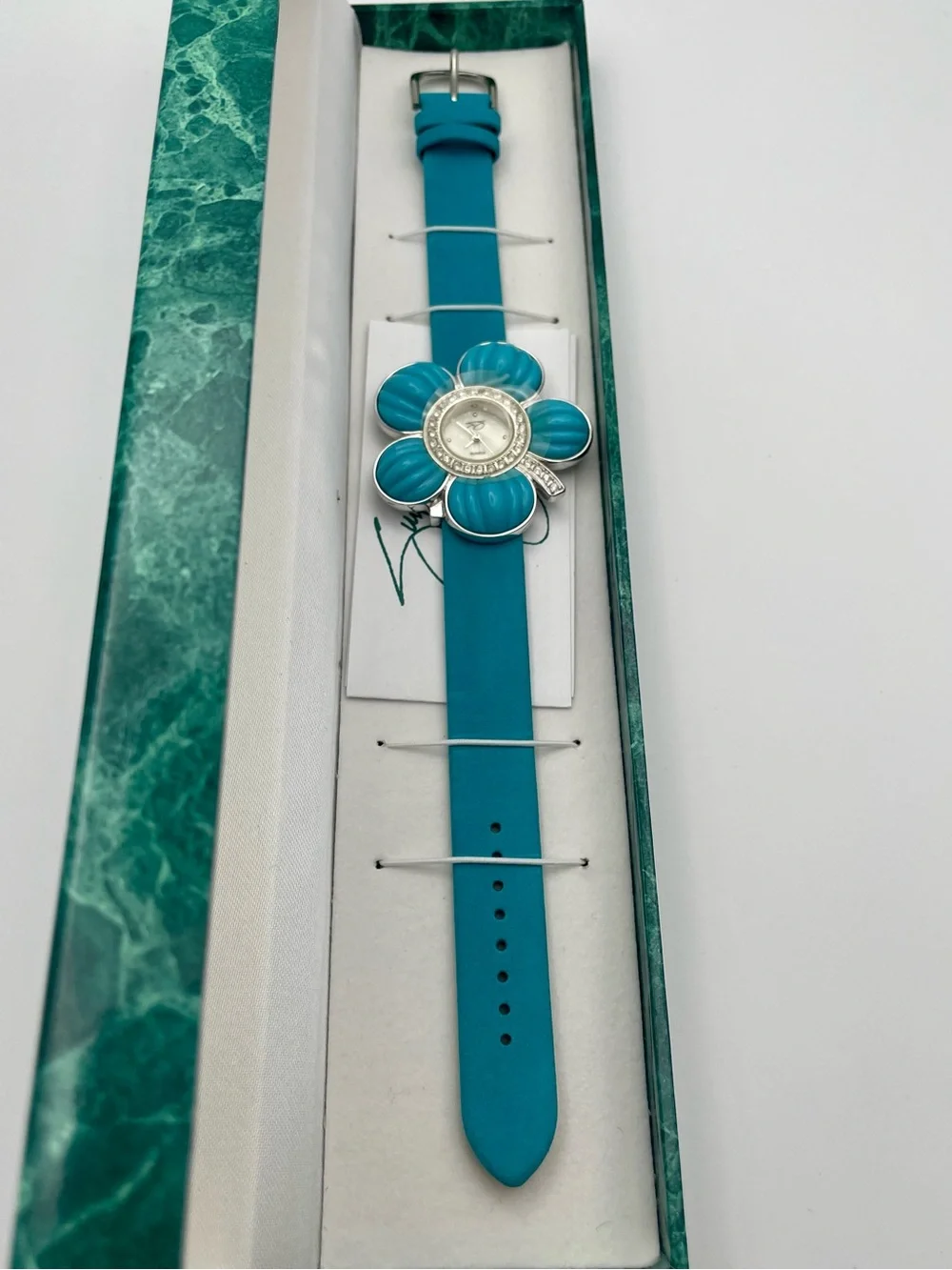 Suzanne Somers Turquoise Flower Watch with Rhinestone Bezel. Blue Leather Band